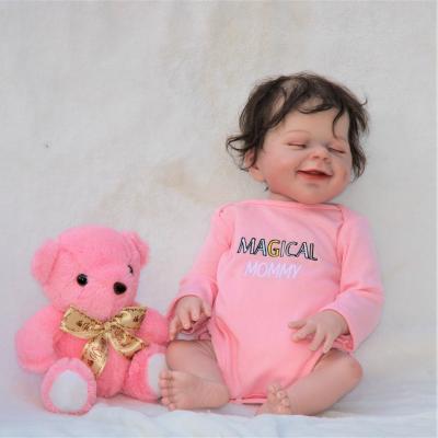 China Changeable Dress 18 Inch Full Silicone April Reborn Baby Doll White Skin Smile Girl Dolls With Cloth For Kid Birthday Gift for sale