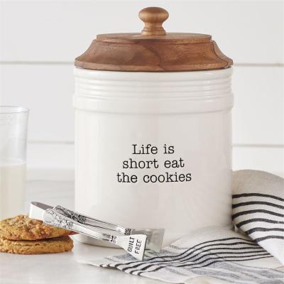 China Sustainable Novelty Stamped Silverplate Ceramic Tongs Cookie Jar With Wooden Lids for sale