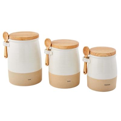 China Freshness Preservation Ceramic Stoneware Bistros Food Canister Set With Wooden Spoon for sale