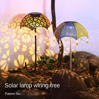 China Solar Powered Cavity Projection Decoration Landscape Yard Shadow Light Iron Lamp Round Flashing LEDG Light for sale