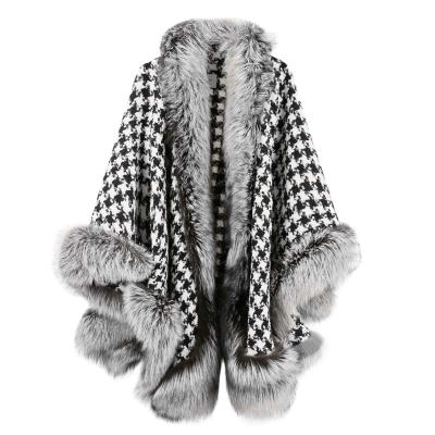 China Anti-wrinkle autumn and winter fashion high-end lady's coat shawl with black and white plaid faux fur coat for sale