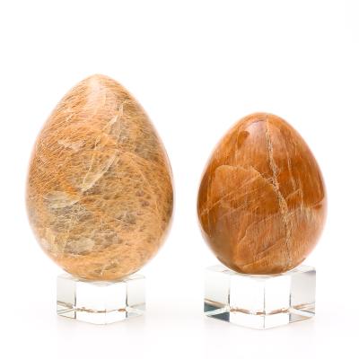 China Wholesale Natural Red Egg Crystal Yoni Egg Healing For Moonstone Decoration From Europe for sale