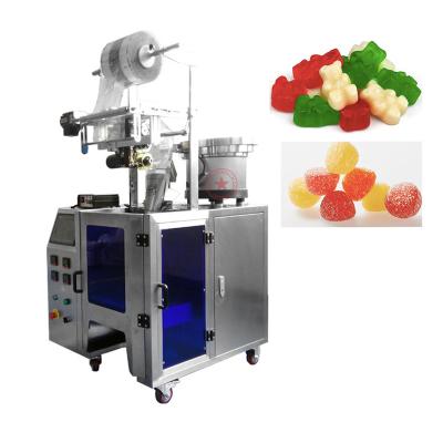 China Small Food Vertical Counting Automatic Candy Gummy Packing Machine For Soft Candy for sale