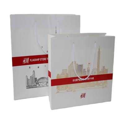 China Best Selling Recyclable Tissue Paper Bag Your Own Logo Shopping Paper Bags For Clothing Accessories for sale