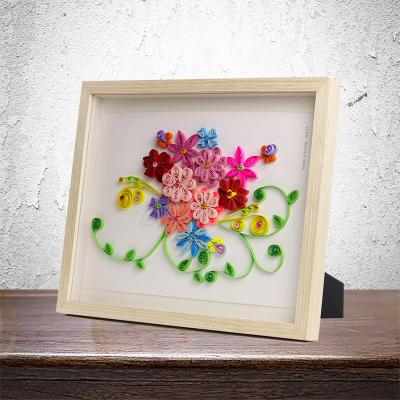 China Environmentally friendly solid wood stitched three-dimensional creative view a4 paper cavity photo frame for sale