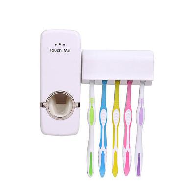 China Viable Wholesale Wall Mounted Toothpaste Dispenser Factory Automatic Toothpaste Dispenser Bathroom Toothbrush Holder for sale