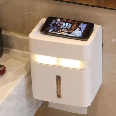 China Minimalist Wall Mounted Small Free Light Hole Induction Smart Night Tissue Box for sale