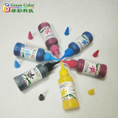 China Bulk Sale Environmental Friendly Waterproof Ink For Epson L1800 Anti Dye Ink UV Inkjet Printer for sale