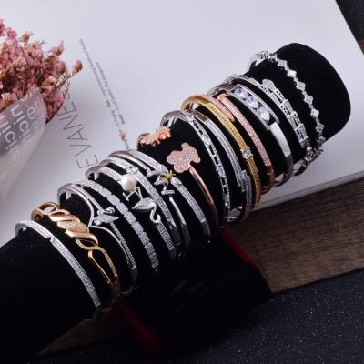 China Cheap Hyperbola Zirconia Bracelet Jewelry Gold Jewelry Bangle Matched Random Mixed Cheap Jewelry Wrist Bracelet for sale