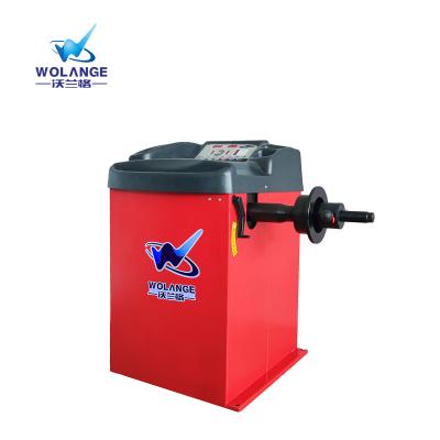 China Smart Impact Testing Machine High Performance Wolange W-600 Car Tire Wheel Balancer Balancing Machine Automatic for sale