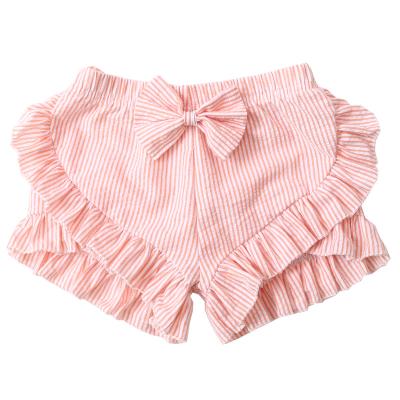 China Wholesale Breathable 100% Cotton Seersucker Ruffle Bow Summer Boutique Babies Shorts for sale