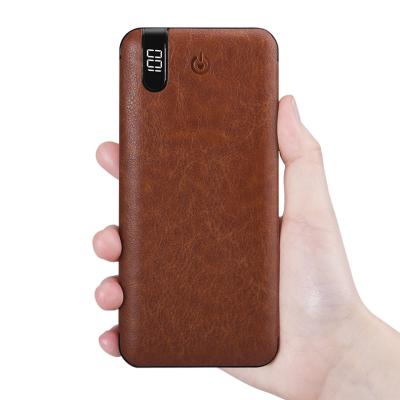 China Quick Charge Support Portable Leather Power Banks 10000mah VIP Power Charger for sale