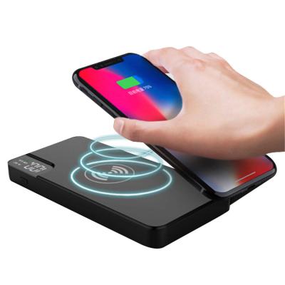 China Fast charging support power bank 10000mah wireless magnetic powerbank battery charger with mobile stand for sale