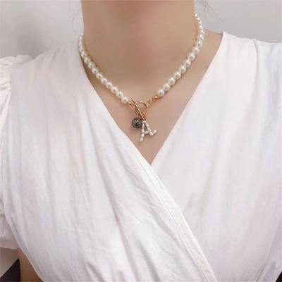 China 2021 Unique New Arrival Fashion OT Fashion Lock Clasp Unique Pearl Necklace Gold Charms Beaded Pendant Necklace For Women for sale