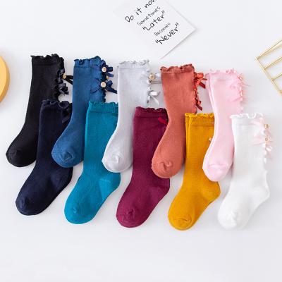 China New Breathable Kids Booties Toddler Girls Big Bow Knitted Knee High Long Soft Cotton Lace Booties Baby Ruffle Socks for sale