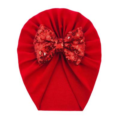 China Hot Selling Character Glitter Bow Baby Cotton Hats Newborn Baby Hat for sale