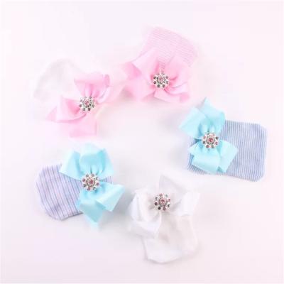 China Striped Newborn Cotton Baby Hospital Hats With Bow for sale