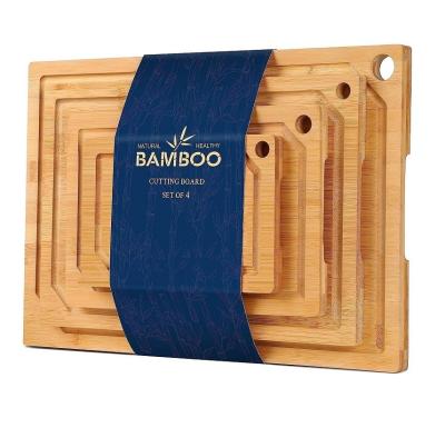 China Com 4 peças em estoque, tabuleiros de corte de bambu, pré-engrasados com sulco de suco, 16 x 1,8 x 12 polegadas. à venda