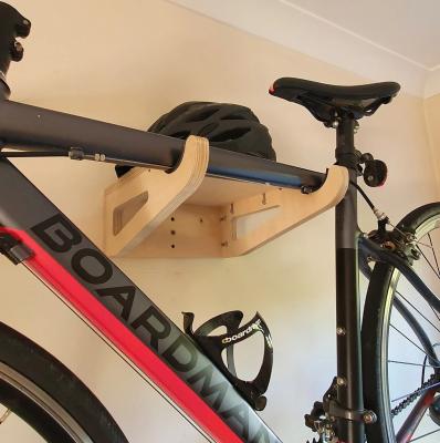 China Living Room Wooden Bike Wall Mount with Shelf Multifunctional and Smart Storage Design for sale