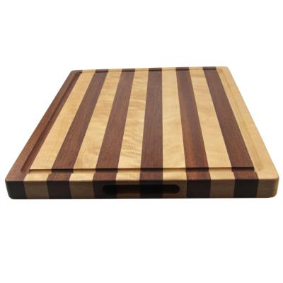 China Customized Size Kitchenware Multi-functional Solid Wood Chopping Board with Handle for sale