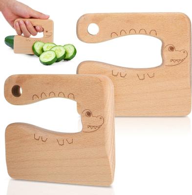 China OEM Wooden Kids Knife for Cooking Cute Fish Dinosaur Shape Kitchen Toy Vegetable Cutter for sale