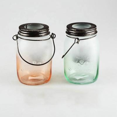 China Stylish and Transparent Glass Storage Jar with Colored Plastic Cover 100% Food Safe for sale