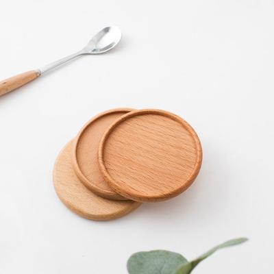 China Custom Stain Color Coasters Sustainable Round Beech Wood Drink Mats for Protection for sale