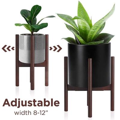 China Adjustable Bamboo Wood Plant Stand for Extendable High Bearing Weight Indoor Outdoor for sale