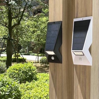 China ROAD Illumination Outdoor Waterproof Motion Sensor Solar Garden Light Led Interaction Solar Wall Lamp for sale