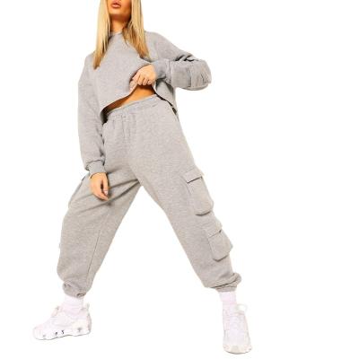 China New Breathable Fashionable Sport Set Oversized Crop Hoodies And Two Piece Cargo Tracker Women Sweats Pants Sets for sale