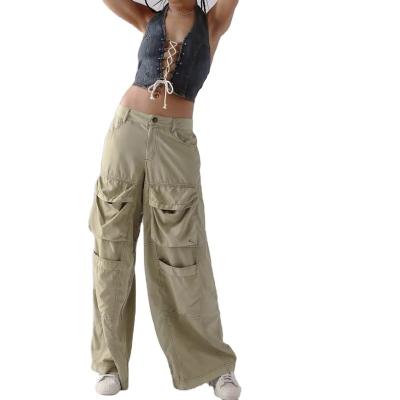 China OEM Streetwear Wide Leg Breathable Polyester Wide Leg Sports Sweatpants 100% Oversized Cargo Pants Women Anorak Pants Pockets Wholesale for sale