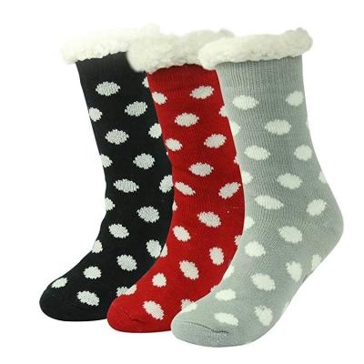 China Sustainable Fleece Lining Fuzzy Soft Christmas Highs Stockings Non Slip Indoor Slipper Socks for sale