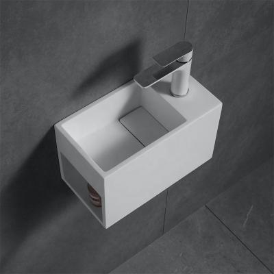 China Wall Hung Counter Top Wash Basin Modern European Luxury Solid Exterior Bathroom Sink Acrylic Resin StoneSinks for sale