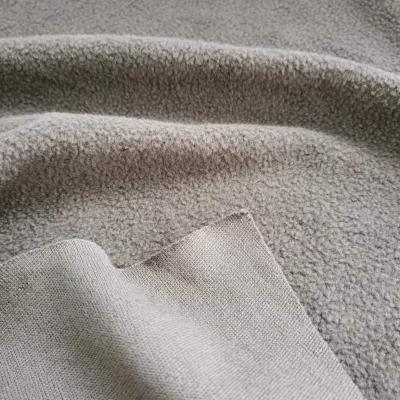 China 2022 sustainable hot sale 100% polyester soft knitted anti pilling plain dyed fleece fabric for autumn and winter coat for sale