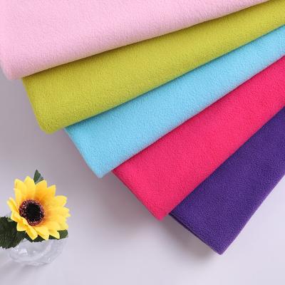 China Viable Custom Design 100% Polyester 150 Gsm Thicken Bilateral Brush Micro Side Brush Anti Pilling Fleece Fabric For Jacket for sale