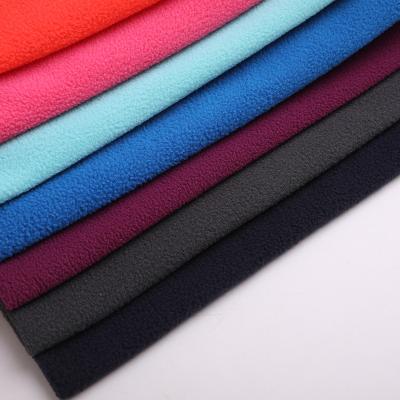 China Sustainable newcomer 100%polyester 155gsm two sided solid color brushed one sided anti micro pilling fleece fabric for coat for sale