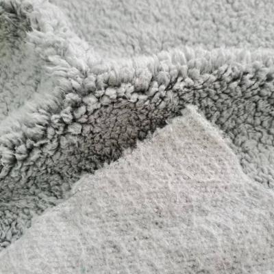 China Durable hot selling polyester plush dyed faux cotton sherpa fleece fabric rolls for winter garment textile for sale