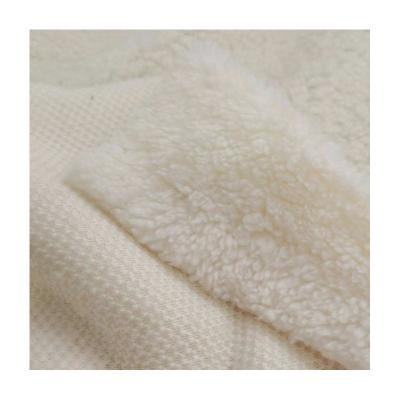 China Sustainable High Quality Single Side Brushed Super Soft 100% Polyester Knitted Sherpa Fleece Fabric For Suit Winter Wear for sale