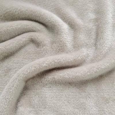 China Soft Stretch Fashion 100% Polyester Knitting Flannel Coral Fleece Fabric Solid Color For Kids Sofa Blanket for sale