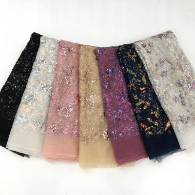 China Latest Viable Design French Dresses Embroidery Fabric Fashion Floral Sequin Lace Fabrics For Dress for sale