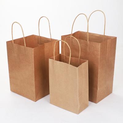 China Recycled Grocery Brown Vegetable Materials Supermarket Packing Craft Recycled Kraft Paper Bag With Handle for sale