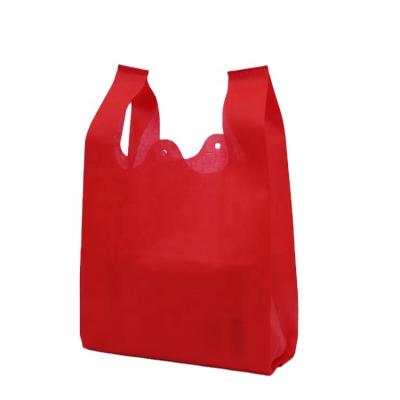 China PUNCH Market Bag Customized Non Woven T Shirt W Cut Out Nonwoven Bag Disposable Shopping Bags for sale