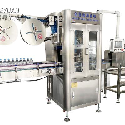 China PVC hot sleeve food vending labeling machine and steam shrink tunnel for water bottle for sale