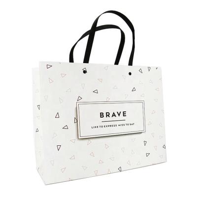 China Recyclable Promotional Cheap Price Custom Kraft Paper Luxury Shopping Bag With Twist Handle for sale