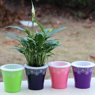 China Modern Quick Supply Home Decor Self Watering Garden Flower Pot Pattern Beautiful Flower Pot for sale