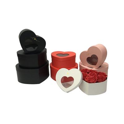 China Open Window Recyclable Simple Heart Shaped Set Of Three Flowers With Hand Gift Box for sale