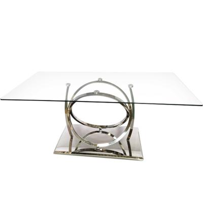 China Mesa de comedor de lujo del metal plateado con el vidrio claro para el comedor en venta