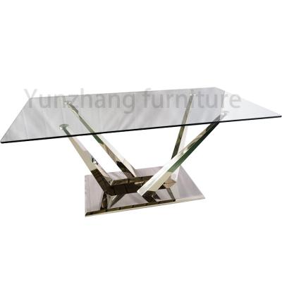 China Silver Color Luxury Modern Dining Tables Glossy Tempered Glass Sophisticated Dining Table for sale