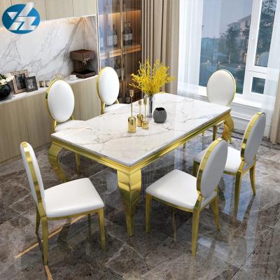 China Upholstered Back Armless Marble Top Dining Chairs with Silver Stainless Steel Base for sale