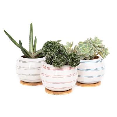 China Small Modern Handmade Round Flower Pots Planter Ceramic Succulent Pot With Tray for sale